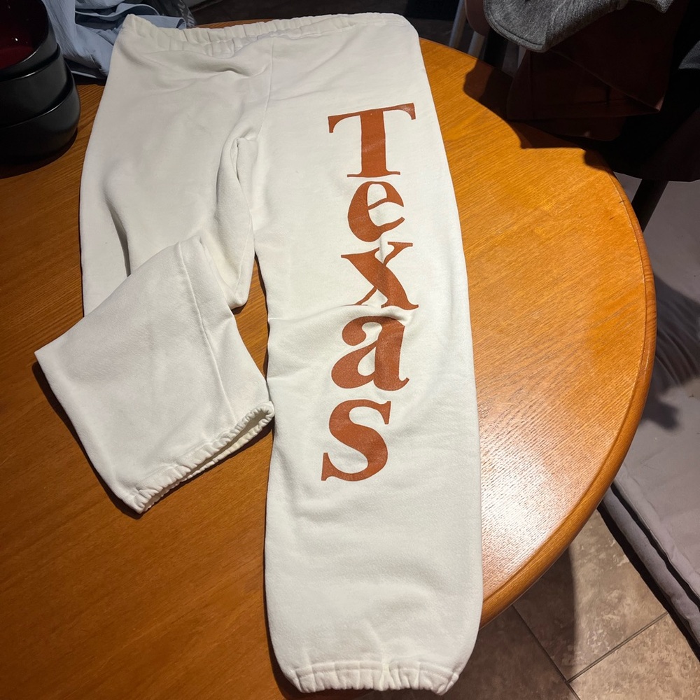 Mens large. White sweat pants with TEXAS